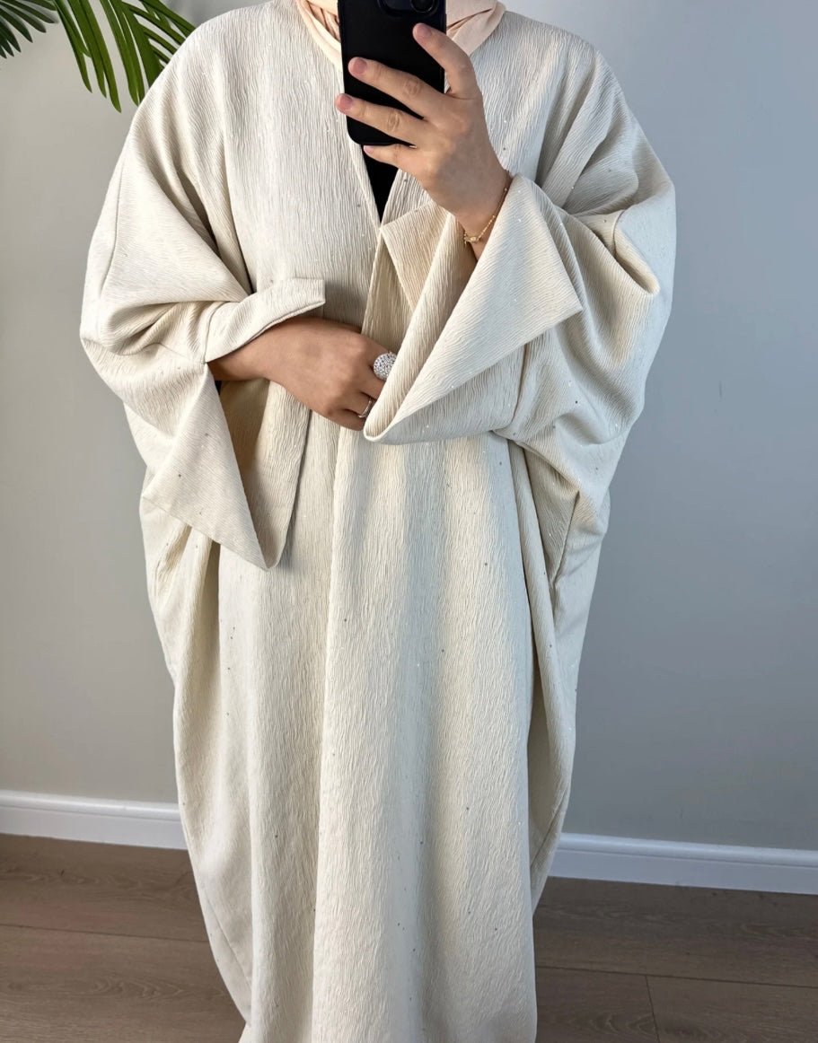 Beige Glitter Ripple Abaya - Premium Abaya’s from Sahara Soireé - Just €75! Shop now at Sahara Soirée